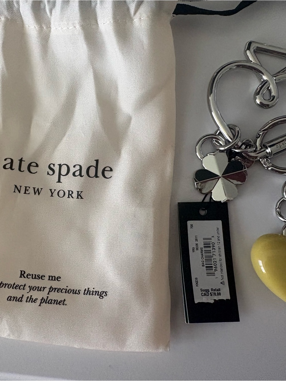 kate spade Silver-Tone Clover & Yellow Heart Keychain Card Holder Charm